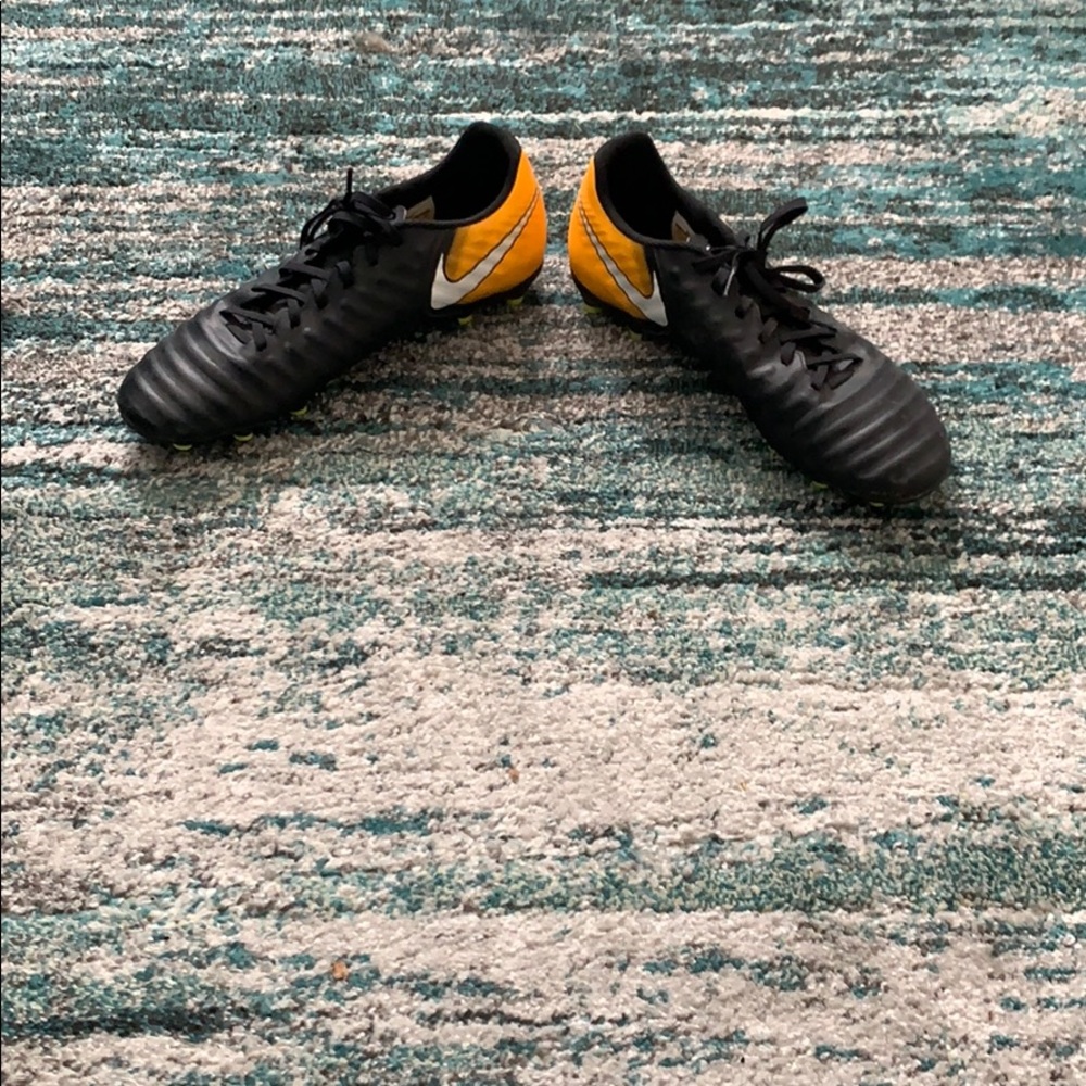 A pair of Nike tiempo soccer cleats